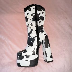 Pretty Little Things Cow Print Platform boots